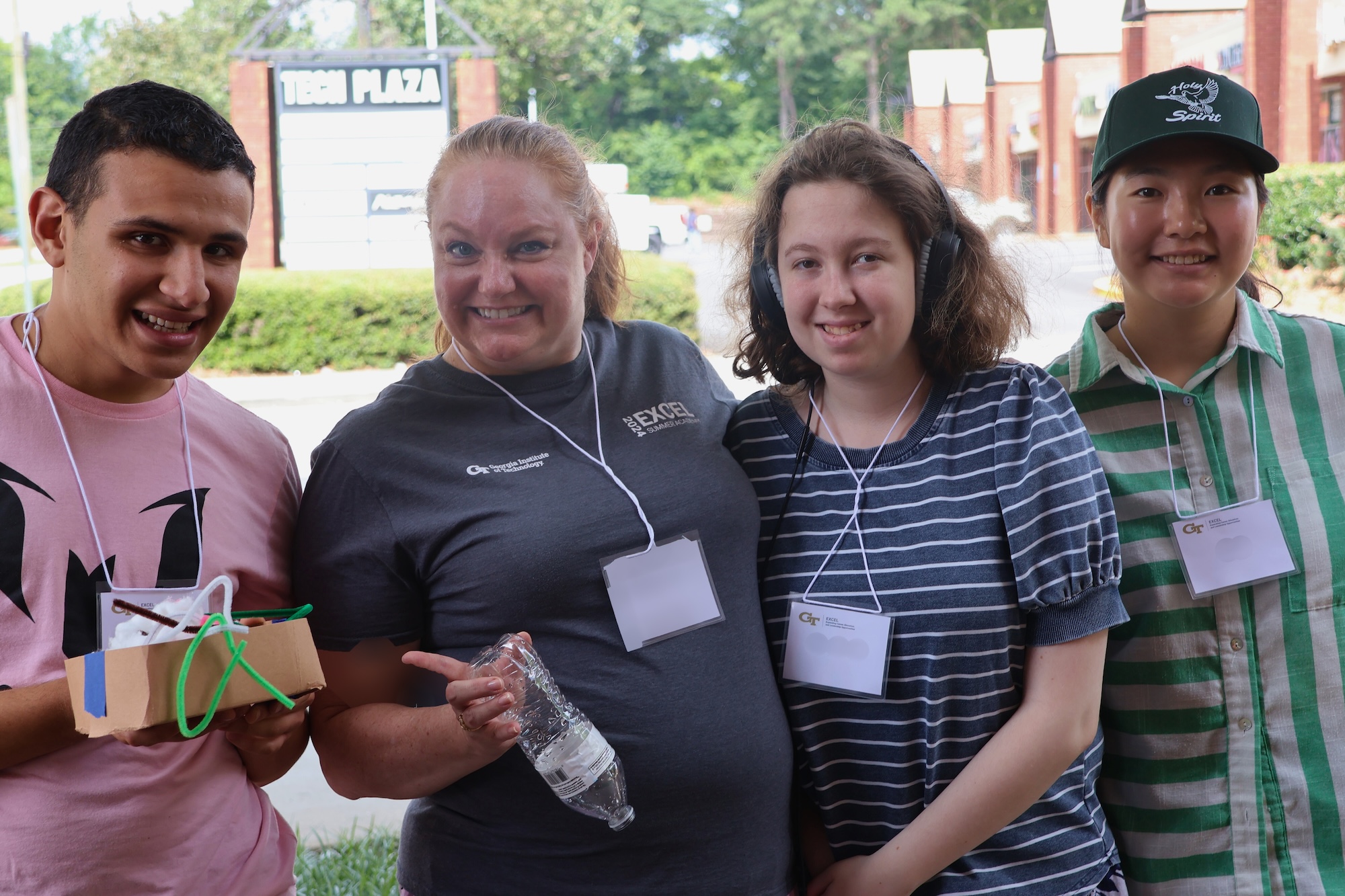 Students and a staff member at EXCEL's Summer Academy